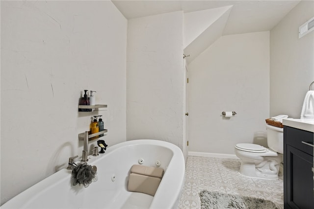 bathroom with a tub with jets, vanity, toilet, tile patterned flooring, and visible vents