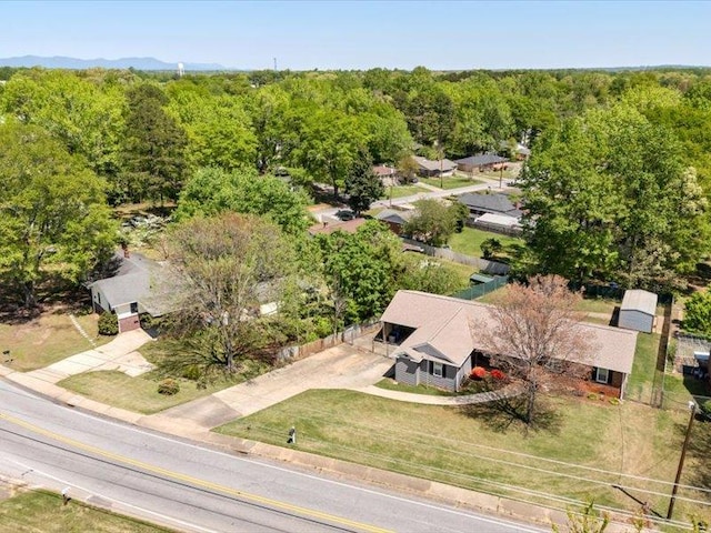 bird's eye view featuring a forest view