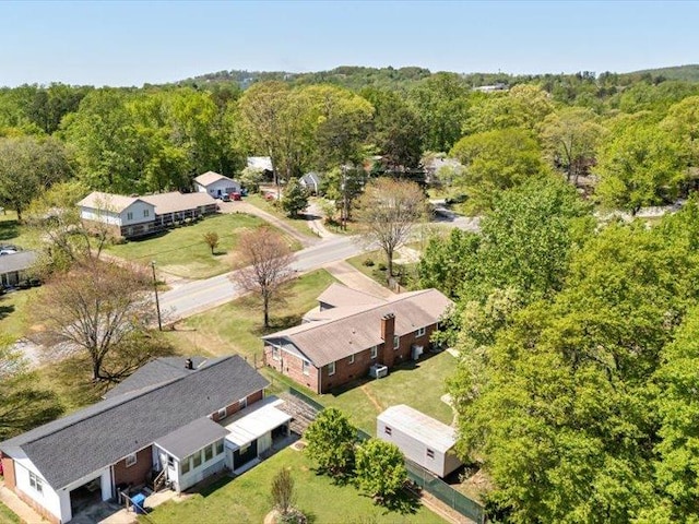 aerial view featuring a view of trees