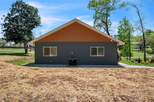 view of side of property featuring cooling unit