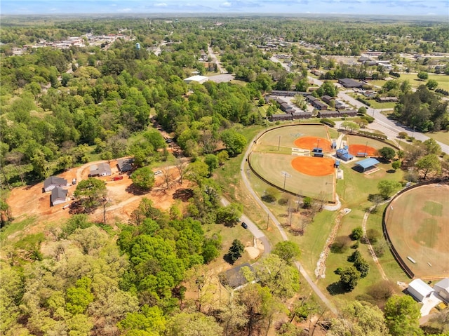 aerial view with a wooded view