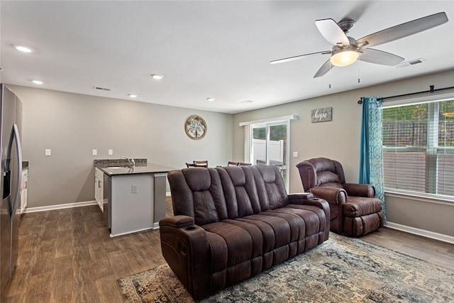 407 Oakmont Valley Trl, Seneca, SC 29678 - living area with dark wood-style floors, baseboards, visible vents, and ceiling fan