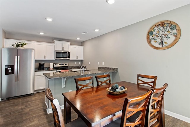 407 Oakmont Valley Trl, Seneca, SC 29678 - dining area featuring dark wood-type flooring, baseboards, and recessed lighting