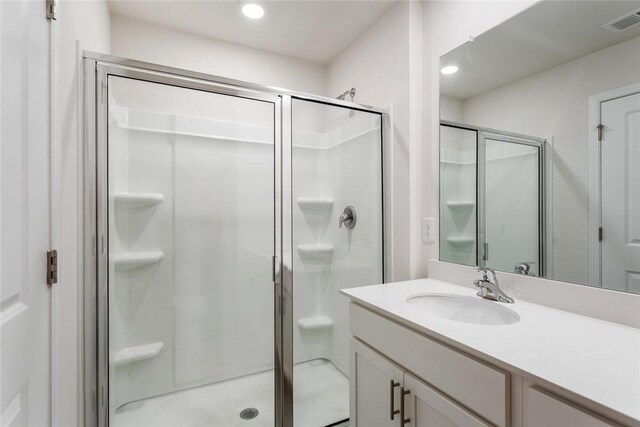 407 Oakmont Valley Trl, Seneca, SC 29678 - full bathroom featuring visible vents, recessed lighting, a stall shower, and vanity
