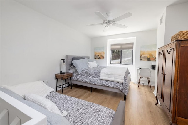 204 Harbor Cove Dr, Salem, SC 29676 - bedroom featuring visible vents, light wood-type flooring, and ceiling fan