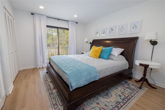 204 Harbor Cove Dr, Salem, SC 29676 - bedroom featuring light wood-type flooring, baseboards, and access to outside