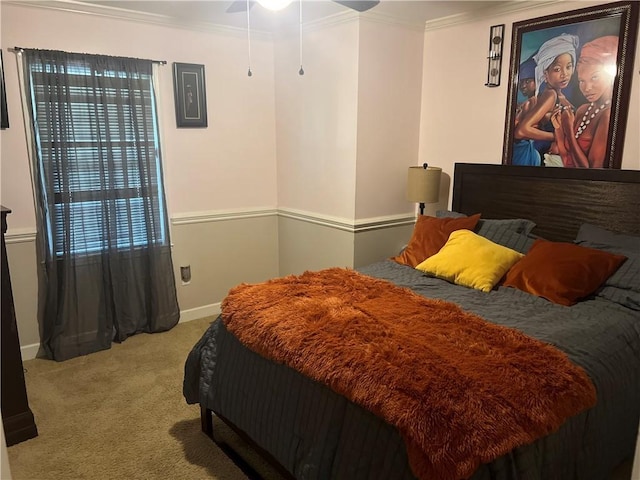 carpeted bedroom featuring ornamental molding and baseboards