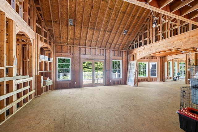 miscellaneous room featuring high vaulted ceiling
