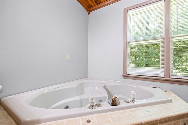 full bath featuring a jetted tub and wooden ceiling
