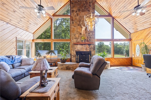 living room featuring a healthy amount of sunlight, high vaulted ceiling, and ceiling fan
