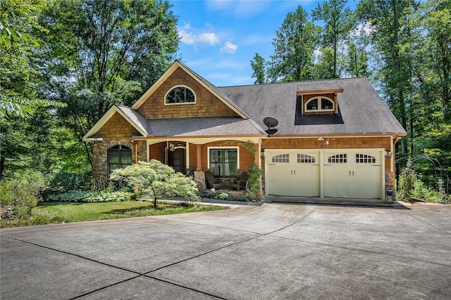 14029 Azalea Dr, Seneca, SC 29678 - view of front of property with an attached garage, stone siding, driveway, and roof with shingles