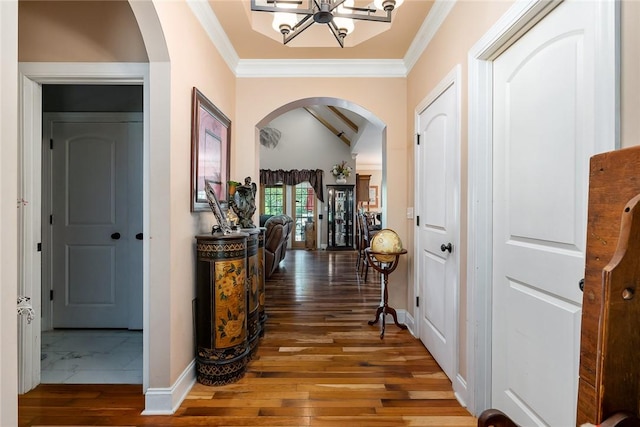 14029 Azalea Dr, Seneca, SC 29678 - hallway with a notable chandelier, baseboards, crown molding, arched walkways, and wood finished floors