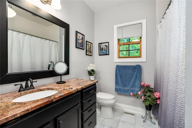 14029 Azalea Dr, Seneca, SC 29678 - bathroom with marble finish floor, visible vents, toilet, vanity, and baseboards