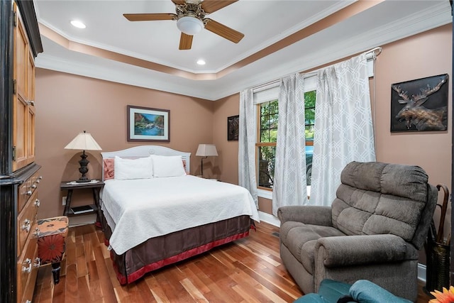 14029 Azalea Dr, Seneca, SC 29678 - bedroom featuring recessed lighting, a raised ceiling, wood finished floors, and crown molding