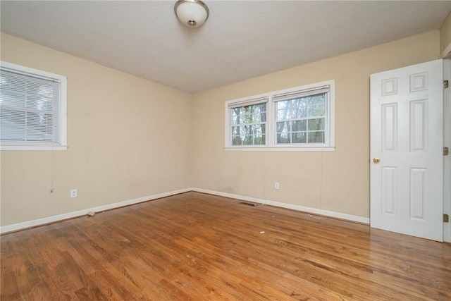204 Clarke Stream Dr, Anderson, SC 29621 - spare room with visible vents, baseboards, and wood finished floors