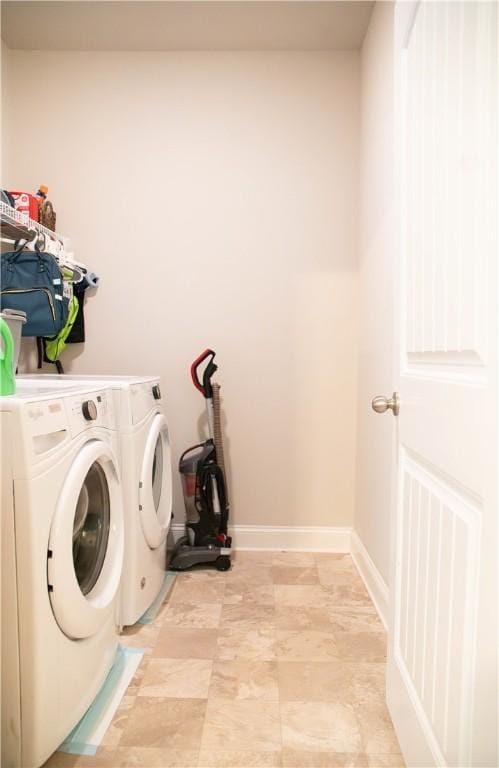 24 Dunsborough Dr, Simpsonville, SC 29680 - washroom with washing machine and clothes dryer, laundry area, and baseboards