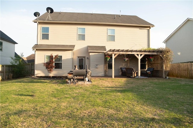 24 Dunsborough Dr, Simpsonville, SC 29680 - rear view of house with a fenced backyard, a pergola, a patio area, and a lawn