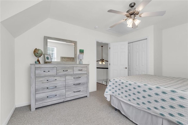 bedroom featuring a closet, a ceiling fan, and light carpet