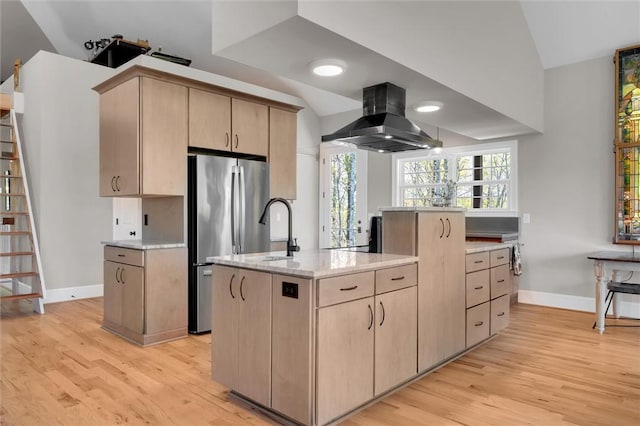 101 Cabernet Way, Travelers Rest, SC 29690 - kitchen featuring freestanding refrigerator, baseboards, light brown cabinetry, and island exhaust hood