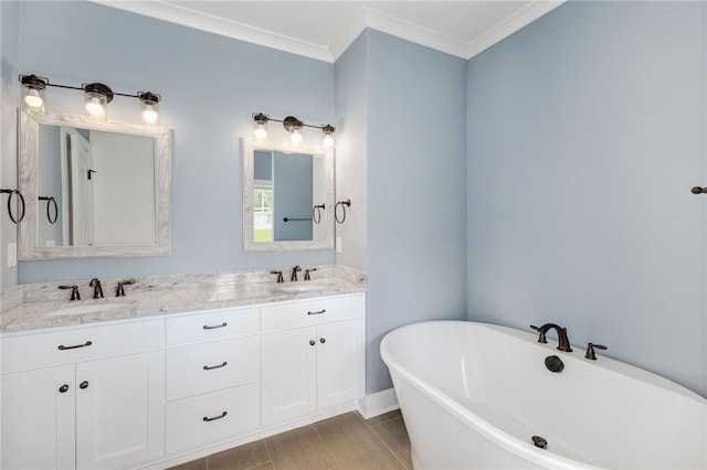 217 Jackson Rd, Iva, SC 29655 - bathroom featuring double vanity, ornamental molding, a sink, and a freestanding bath