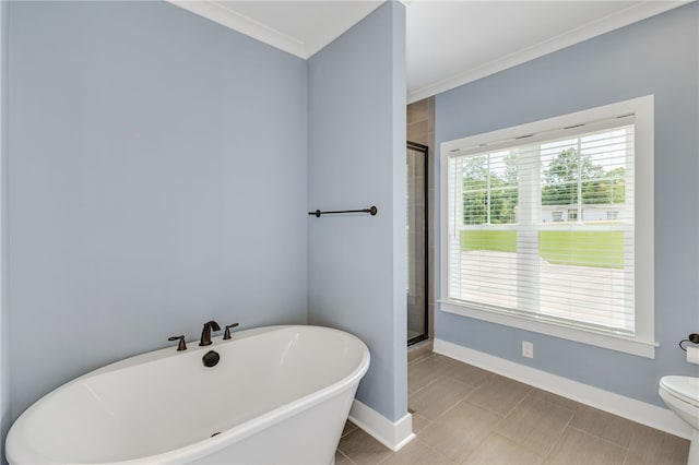 217 Jackson Rd, Iva, SC 29655 - full bath with a shower stall, toilet, crown molding, baseboards, and a freestanding tub