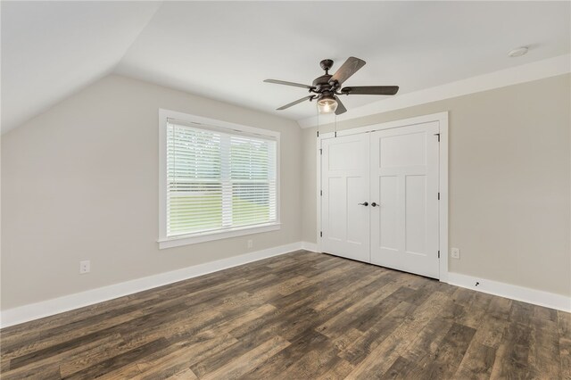 217 Jackson Rd, Iva, SC 29655 - unfurnished bedroom featuring lofted ceiling, dark wood-style floors, a ceiling fan, a closet, and baseboards