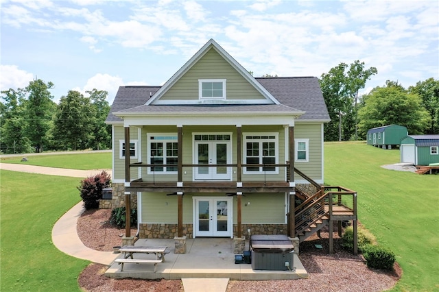 217 Jackson Rd, Iva, SC 29655 - rear view of house featuring french doors, a lawn, a hot tub, and a patio
