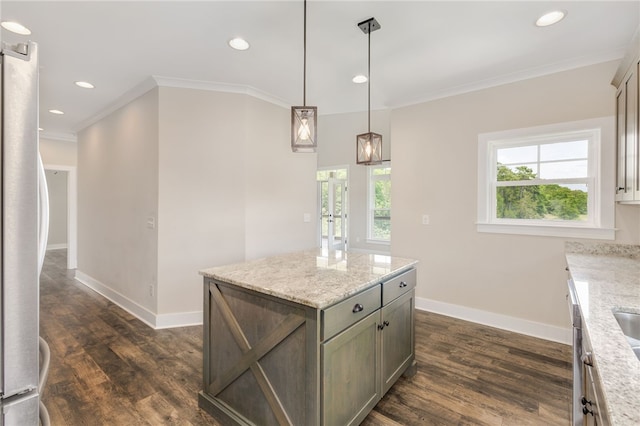 217 Jackson Rd, Iva, SC 29655 - kitchen with baseboards, ornamental molding, dark wood-type flooring, and freestanding refrigerator