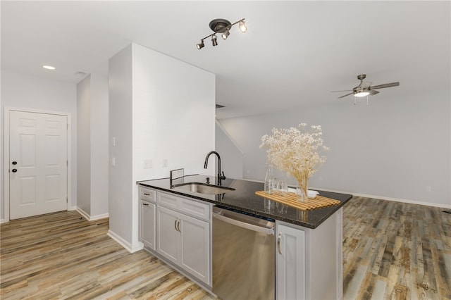 101 Pin Oak Ct, Easley, SC 29642 - kitchen featuring a sink, light wood finished floors, a ceiling fan, baseboards, and stainless steel dishwasher