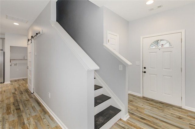 101 Pin Oak Ct, Easley, SC 29642 - foyer entrance with visible vents, light wood-style floors, and stairs