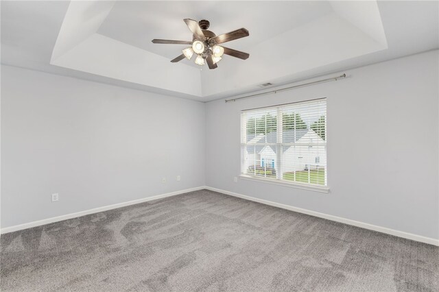 101 Pin Oak Ct, Easley, SC 29642 - carpeted empty room featuring baseboards, a tray ceiling, and ceiling fan