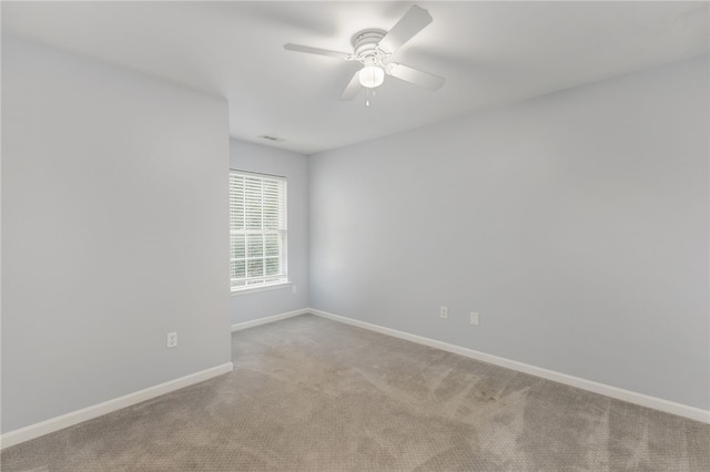 101 Pin Oak Ct, Easley, SC 29642 - spare room with baseboards, a ceiling fan, and carpet flooring