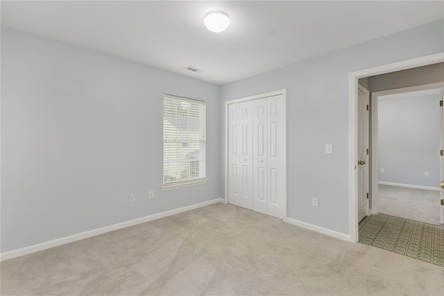 101 Pin Oak Ct, Easley, SC 29642 - unfurnished bedroom with carpet floors, baseboards, a closet, and visible vents