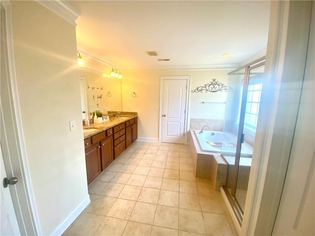 full bath featuring a bath, tile patterned floors, a sink, double vanity, and ornamental molding