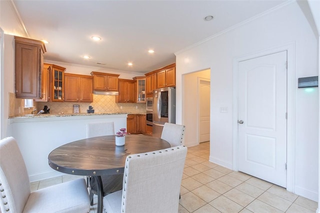 118 Easy Gap Rd, Anderson, SC 29621 - dining area with light tile patterned floors, crown molding, recessed lighting, and baseboards