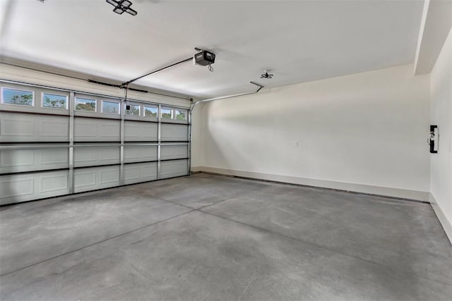 138 Jackson Cir, Anderson, SC 29625 - garage with baseboards and a garage door opener