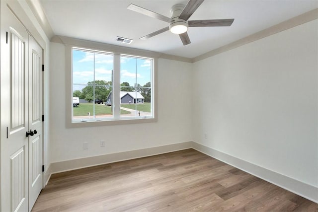 138 Jackson Cir, Anderson, SC 29625 - spare room featuring visible vents, light wood finished floors, a wealth of natural light, and ceiling fan