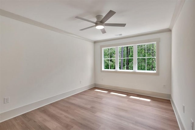 138 Jackson Cir, Anderson, SC 29625 - empty room featuring light wood-type flooring, visible vents, a ceiling fan, and baseboards