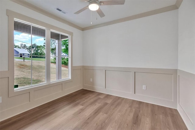 138 Jackson Cir, Anderson, SC 29625 - unfurnished room featuring a decorative wall, wood finished floors, and visible vents