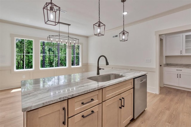 138 Jackson Cir, Anderson, SC 29625 - kitchen featuring stainless steel dishwasher, a sink, light stone countertops, a center island with sink, and light wood-style flooring