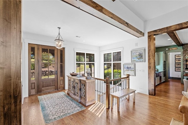 211 Quay Ct, Sunset, SC 29685 - foyer entrance featuring beamed ceiling, wood finished floors, and visible vents