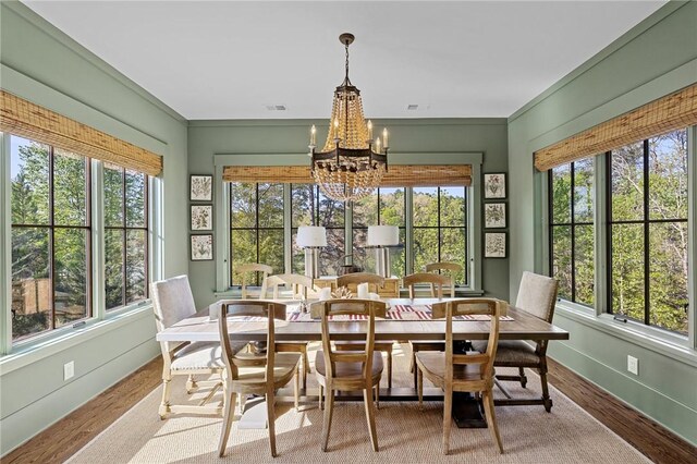 211 Quay Ct, Sunset, SC 29685 - sunroom / solarium featuring a notable chandelier, baseboards, and a healthy amount of sunlight