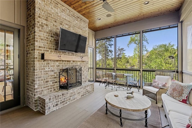 211 Quay Ct, Sunset, SC 29685 - living area with wood ceiling, ceiling fan, a brick fireplace, and hardwood / wood-style floors