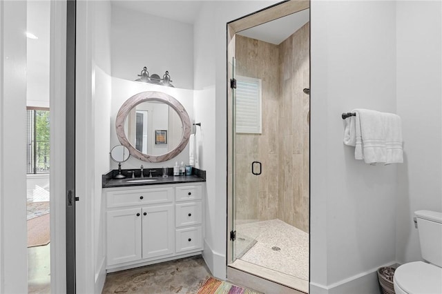 211 Quay Ct, Sunset, SC 29685 - bathroom featuring baseboards, vanity, toilet, and a stall shower