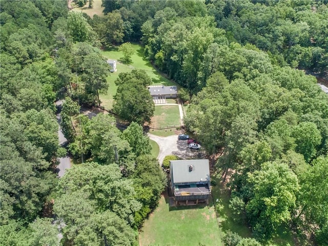 aerial view featuring a view of trees