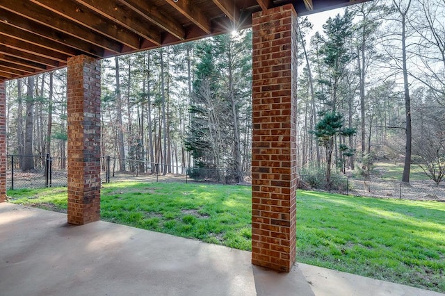 view of patio / terrace featuring fence