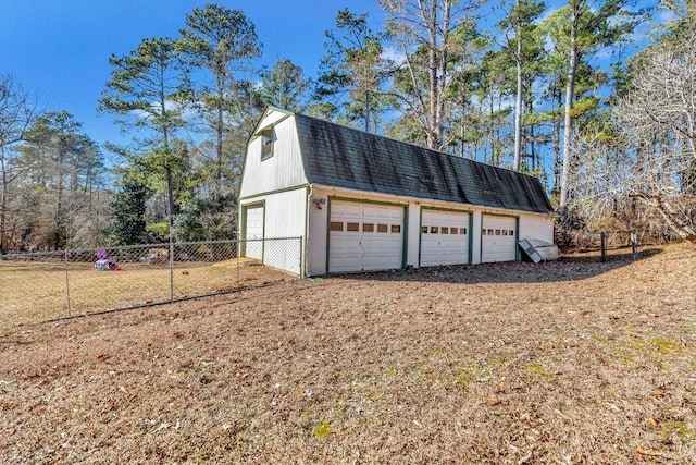 detached garage with fence