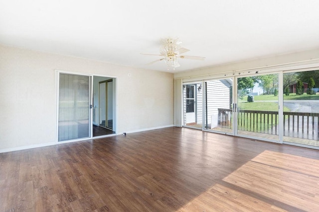 221 Lakeview Dr, Liberty, SC 29657 - unfurnished room with baseboards, a ceiling fan, and wood finished floors