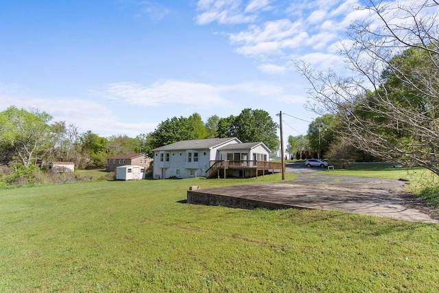 221 Lakeview Dr, Liberty, SC 29657 - view of yard with driveway, a deck, an outdoor structure, and a shed