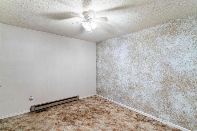 221 Lakeview Dr, Liberty, SC 29657 - spare room featuring a baseboard heating unit, a textured ceiling, baseboards, a ceiling fan, and carpet floors